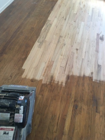 Wide-plank hardwood floor installation and refinishing in a Los Angeles home